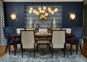 dark blue and wood dining room blue velvet chairs and blue accent wall