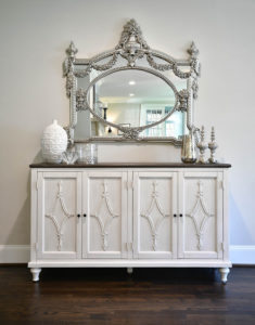 silver mirror with white vanity